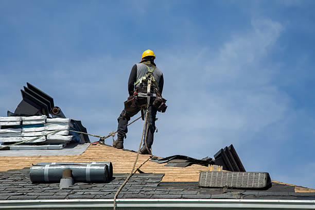 Professional Gutter Installation technician working in Manson, WA